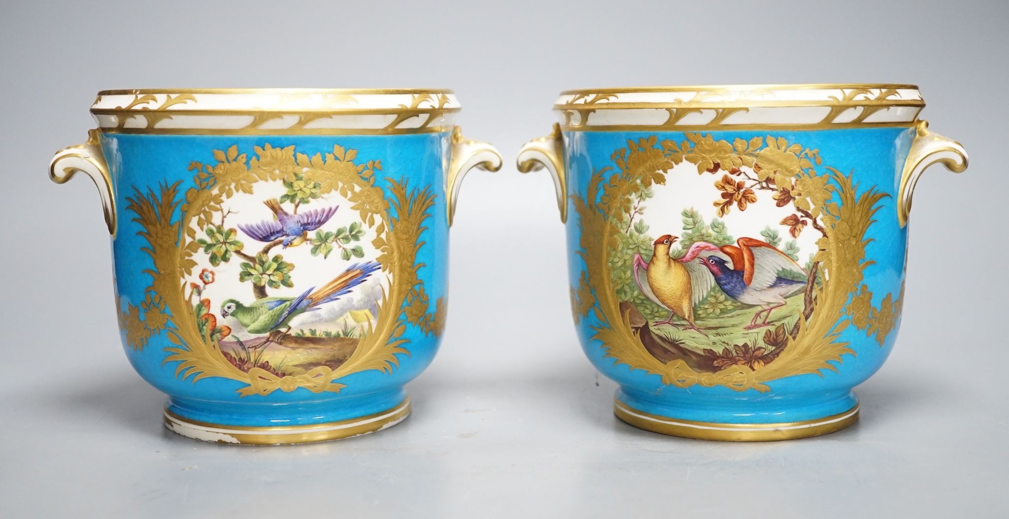 A pair of mid 19th century English porcelain cache pots, 14.5 cms high.